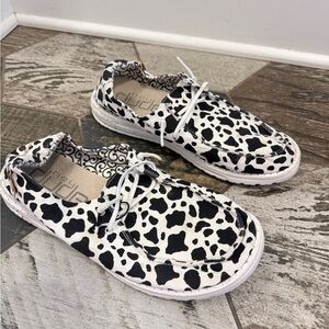 Womens Cow Print Slip-On Hey Dude Shoes - White & Black